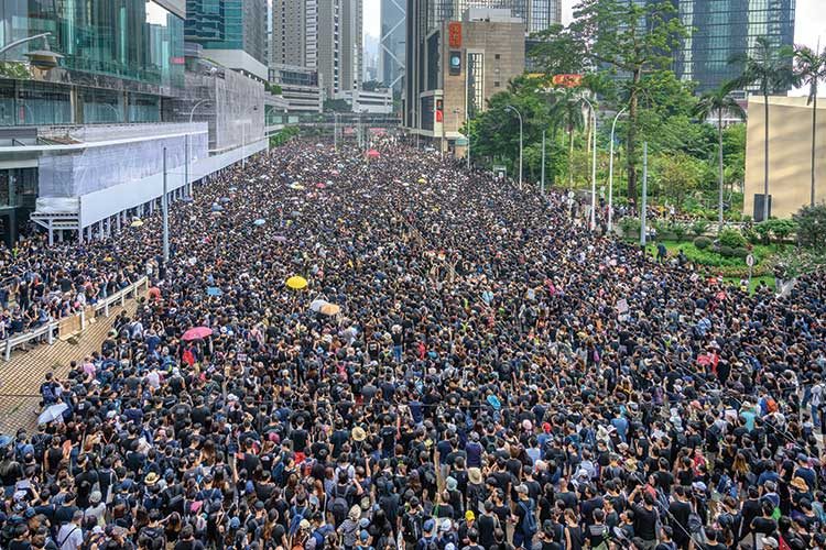 Analysts predict Hong Kong protests may benefit Macau
