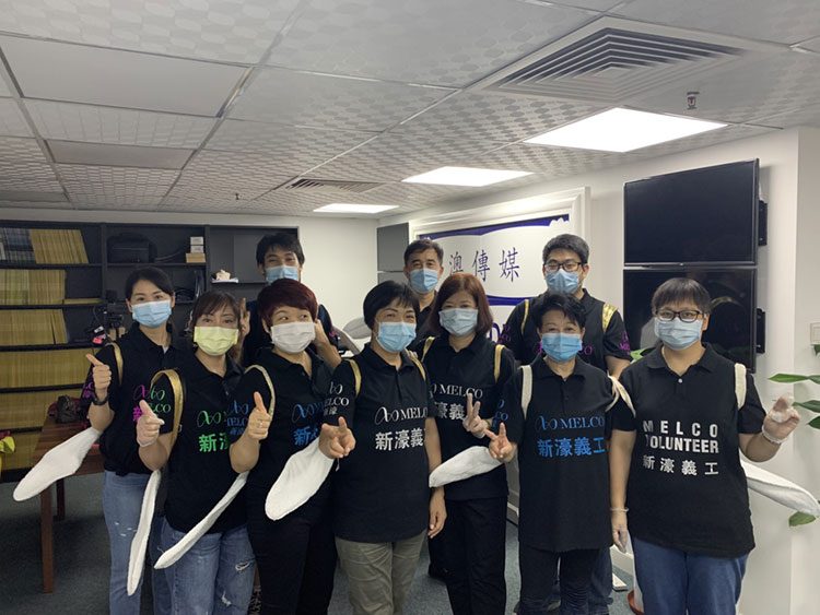 Melco volunteer team arrives to clean the IAG office