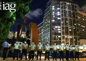 Construction workers protest near Macau’s China Liaison Office