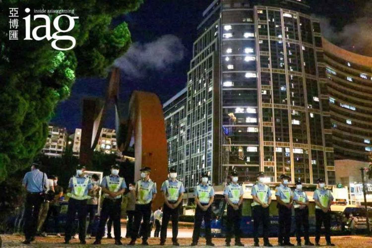 Construction workers protest near Macau’s China Liaison Office