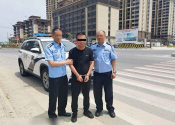 Police say Macau hotel murder victim was a gang member killed over money